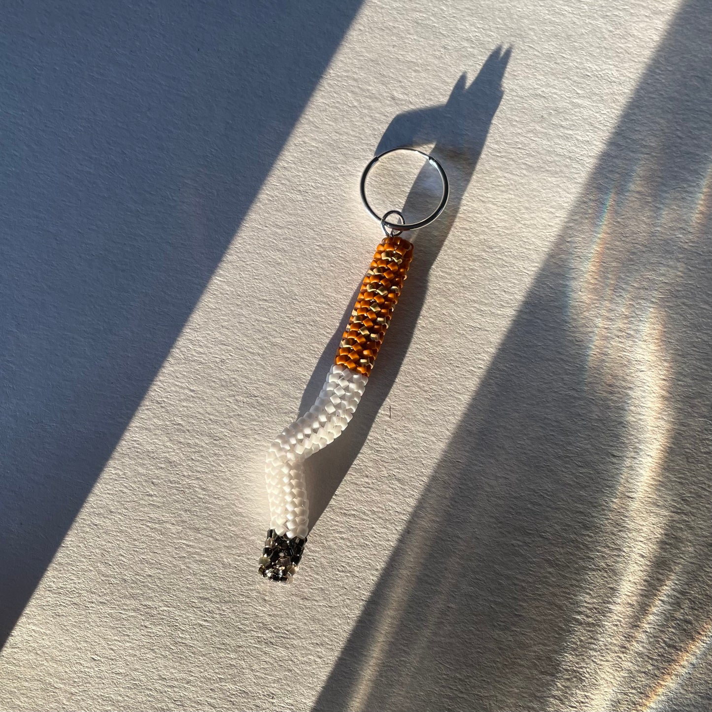 Loosey earring J - maxi squiggle butt